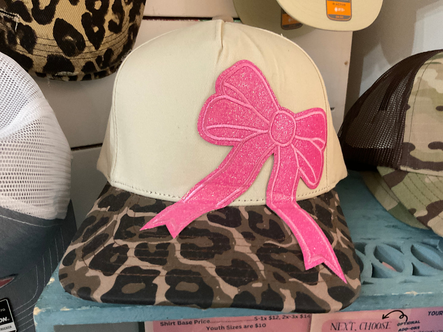 Leopard hat with pink bow