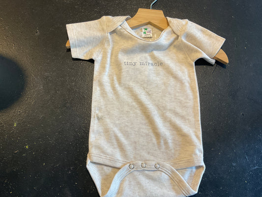 tiny miracle onesie
