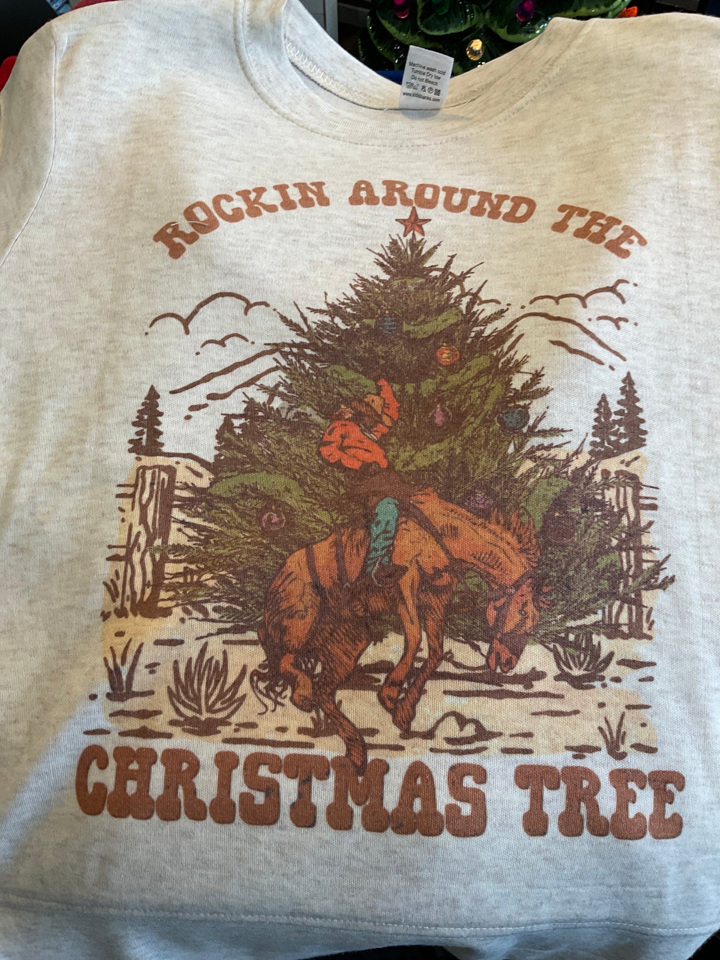 D’s Designs rocking around the Christmas tree kids Tee